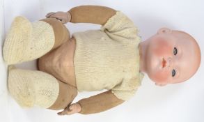 ARMAND MARSEILLE: An antique A&M Armand Marseille bisque headed doll. Stamped A&M 341 .