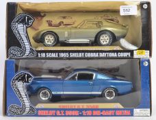 SHELBY COLLECTIBLES: 2x Shelby Collectibles 1:18 scale diecast model cars, each boxed,