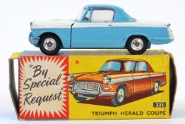 CORGI: An original vintage Corgi Toys 231 Triumph Herald Coupe diecast model,