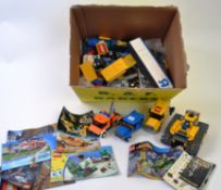 LEGO; A crate of assorted loose vintage Lego to include various instruction manuals, Star Wars,
