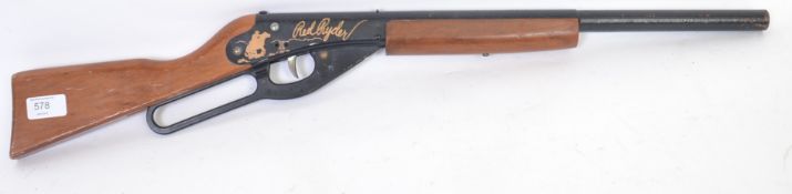 RED RYDER: An original vintage Daisy Red Ryder childs cork shotgun,