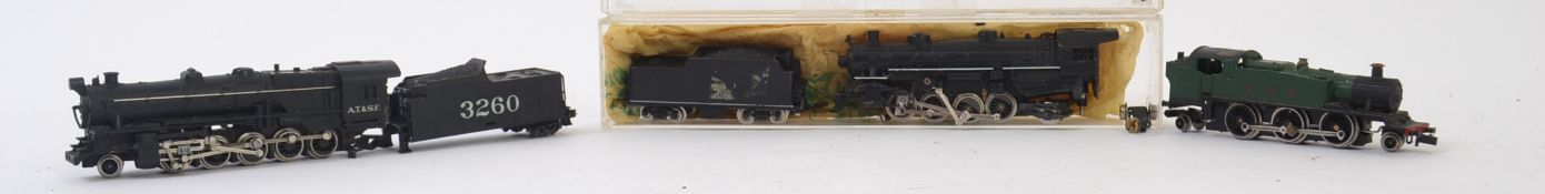 N GAUGE LOCOMOTIVES; A collection of 3x N Gauge locomotives to include Atlas Italy black loco,