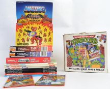 1980's TOYS: A collection of 80's retro themed toys to include vintage Transformers Annuals,
