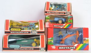 BRITAINS: A collection of 5x Britains Farm boxed diecast models: Manure Spreader, Rotary Tedder,