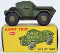 DINKY: A vintage Dinky Toys 673 military Scout car - within the original box.