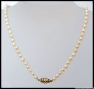 A gilded silver 925 marked cultured pearl necklace.