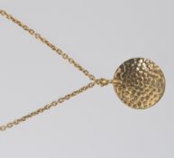 A gilded silver hallmarked ladies necklace and roundel pendant. Hallmarked with makers mark.
