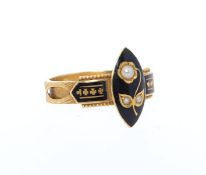 A 19th century gold and enamel  mourning ring with stylised shank with enamel and gold shoulders