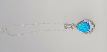 A silver and opalite  pendant necklace on silver chain. Total weight 5.