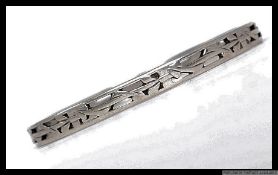 Hallmarked silver bangle with pierced deoration. Weight 18.6g.