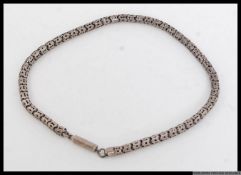 A 20th century silver Balinese cylinder snake chain complete with cylinder clasp.