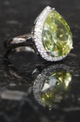 A contemporary ladies silver and CZ pear shaped citrine dress / cocktail ring. Total weight 7.