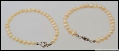 2 vintage ( pair of )  20th century ladies matching cultured pearl bangles each with white metal