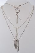 2 silver contemporary necklaces to include finial pendants,