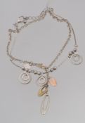 A contemporary ladies silver charm bracelet together with another charm bracelet. Total weight 8.