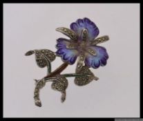 A vintage white metal enamel and marcasite stylised pansy flower brooch. Length 5cms. Weight 16.