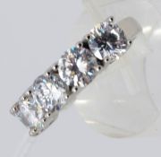 A silver and cz five stone dress ring. Total weight 5.