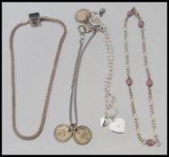 A collection of four 925 silver and gem set bracelets to include Rhona Sutton.Weight 15.