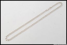 An Italian silver curb chain necklace with marks 925 and Italy. Length 18