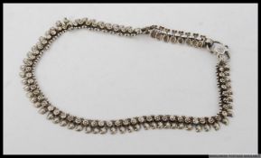 Indian silver ankle bracelet payal with marks to s clasp. Length 11