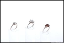 Three vintage silver gem set dress rings marked silver 925. Sizes M, T, N.