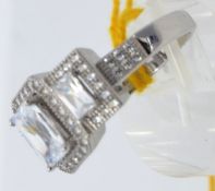 A silver and CZ Dress ring. Total weight 5.9g / Size R.