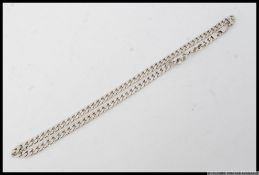 A large heavy set silver curb chain necklace with marks 925. Length 20