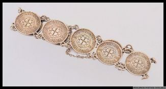 A vintage silver Three Pence Georges VI bracelet with 9 coin links all dated 1941 complete with
