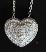 A silver and CZ heart shaped necklace. Total weight 4.3g.