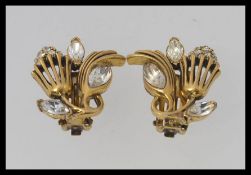 A vintage pair of Kramer of New York yellow metal and quartz stone clip on earrings in the form of