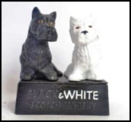 A reproduction cast iron Black & White W