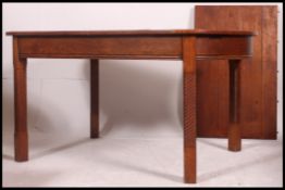 An early 20th century golden oak extendi