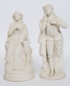 A pair of parian ware figurines to inclu