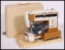A vintage 1950's sewing machine complete