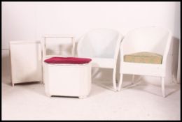 A collection of Lloyd Loom style furnish