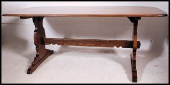 A large Golden Dawn Ercol refectory dini