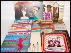 A collection  of vinyl long play records