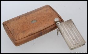 A silver engine turned vesta stamped 925 with removable striker in the form of a book.