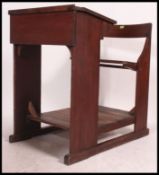 A fabulous large late 19th century oak lecturers  / teachers desk and bench seat combination.