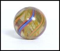 A good Victorian 19th century large spiral multi colour helix twist marble.