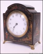A 1930's Japanese chinoserie decorated mantel clock. French brass movement with enamel face.