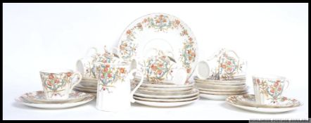 A pretty 19th century Victorian hand painted floral tea service,
