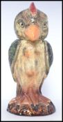 A tobacco jar canister in the form of a grotesque bird, in the style of Martin Brothers.
