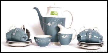 A Royal Doulton part tea service in the Reflection pattern model no TC1008 to include cups,