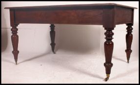 A large good quality Victorian mahogany dining table.