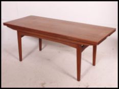 A rare and unusual 1970's metamorphic  extending fold over Danish coffee table.