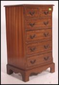 A good quality Georgian style 20th century small  mahogany reproduction two over four chest of