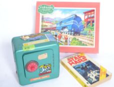 A vintage mid century Victory wooden jig saw puzzle along with a retro tin money box and a Star