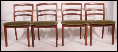 A good set of 4 vintage retro dining chairs by G-Plan raised on shaped legs with overstuffed seats
