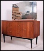A retro 1970's small teak wood dressing table chest of drawers.